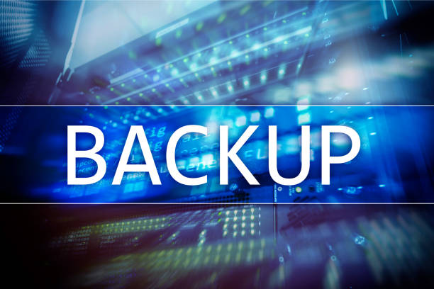 Backup button on modern server room background. Data loss prevention. System recovery.