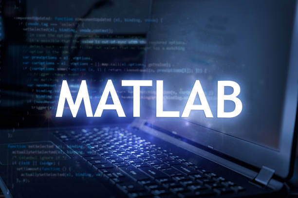 MATLAB inscription against laptop and code background.